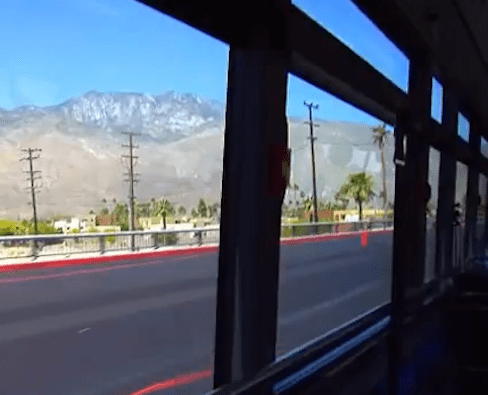 mountains visible through the bus window